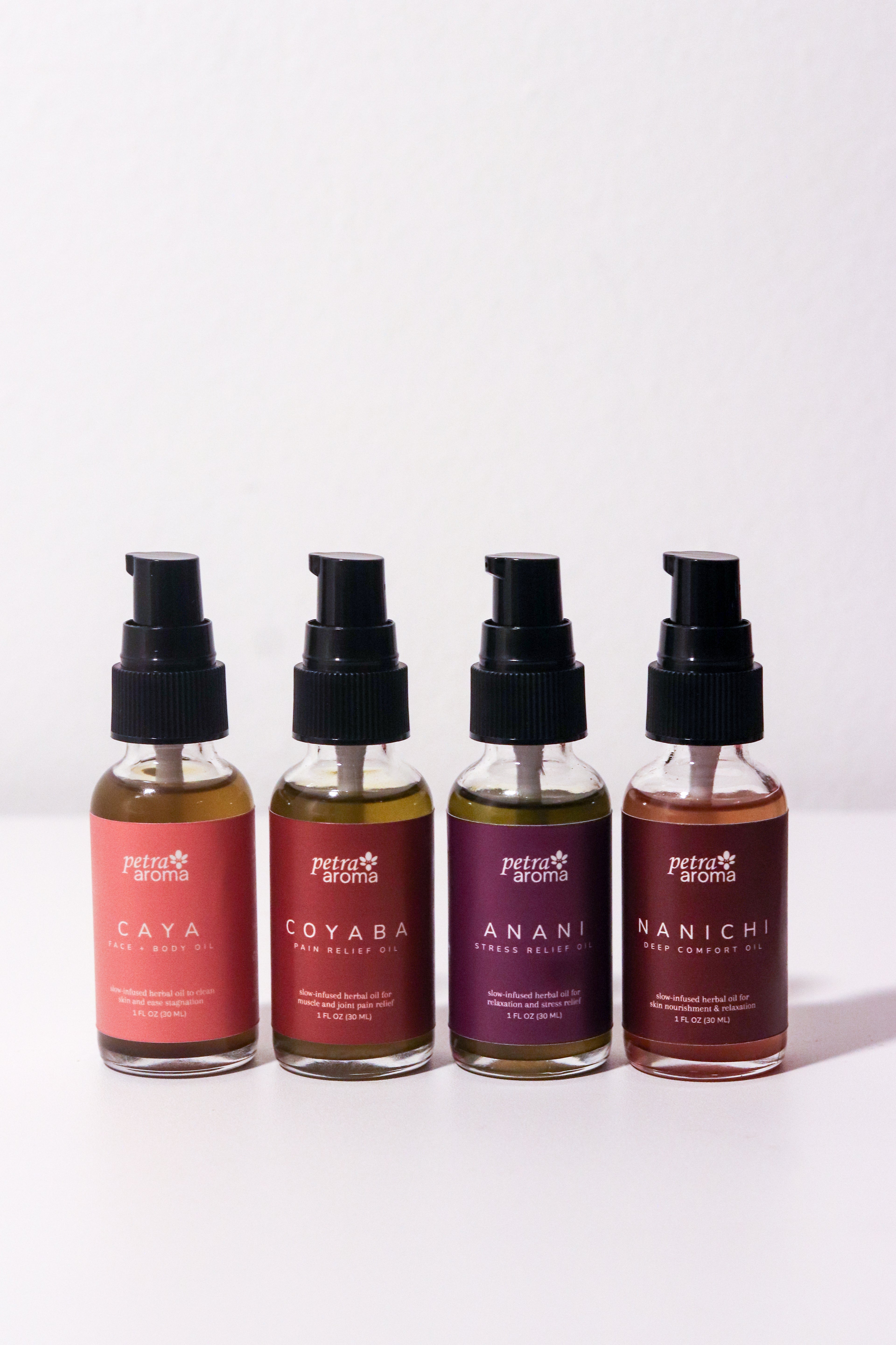 Four bottles of Peter Lamas hair care products on a white background